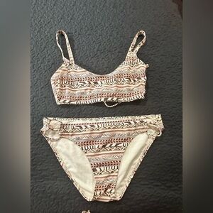 Women’s Xhiliration bikini. XL.Goes great with shirts/cutoffs or skirt.